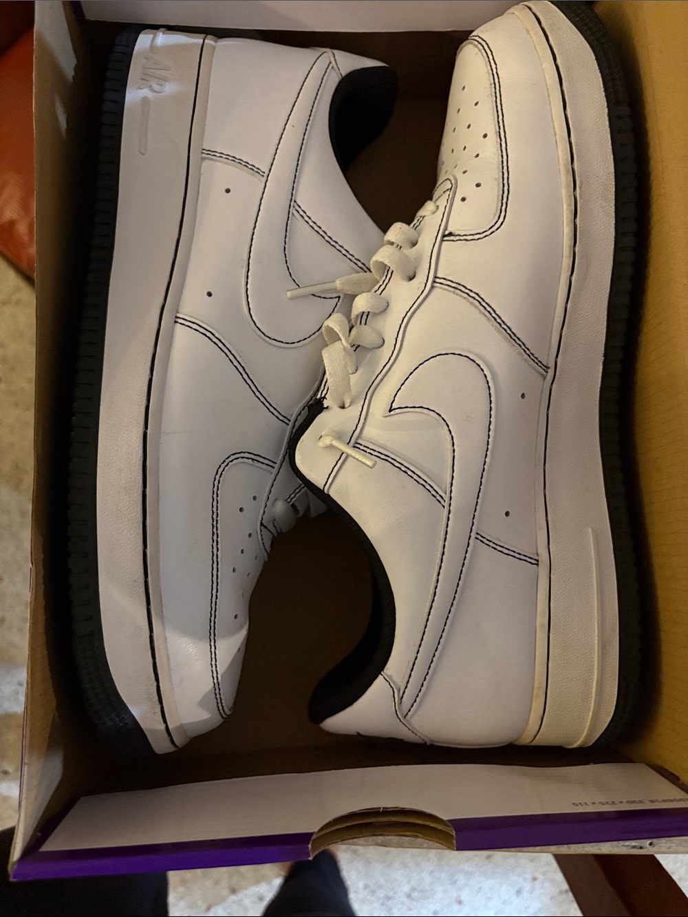 Nike White Leather Low-Top Sneakers with Black Soles